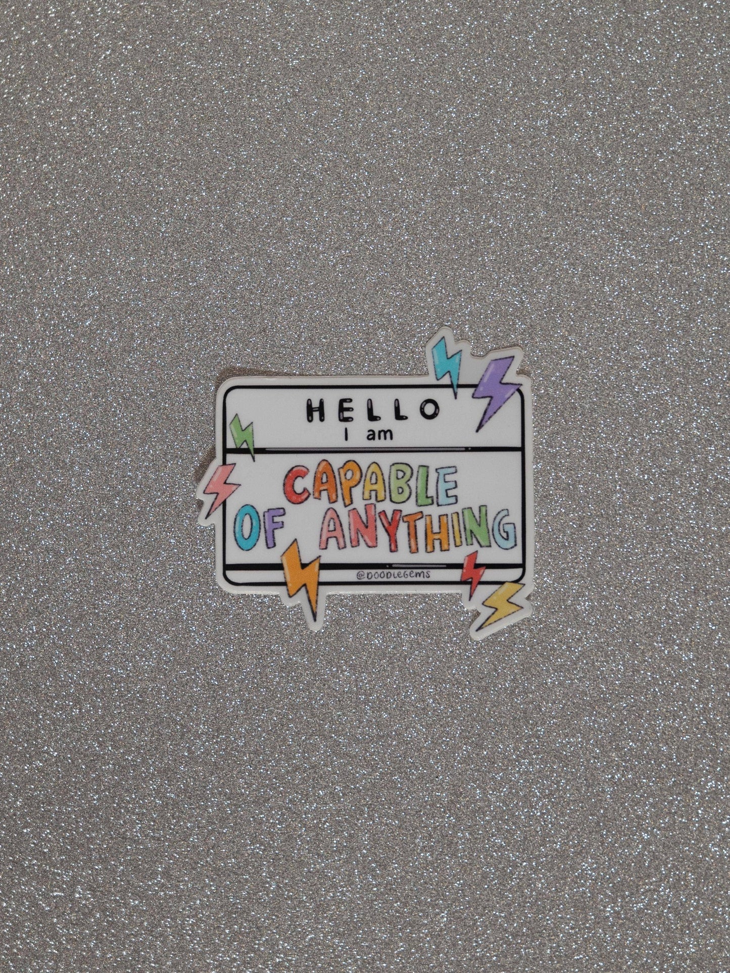 Motivational sticker on a textured gray background