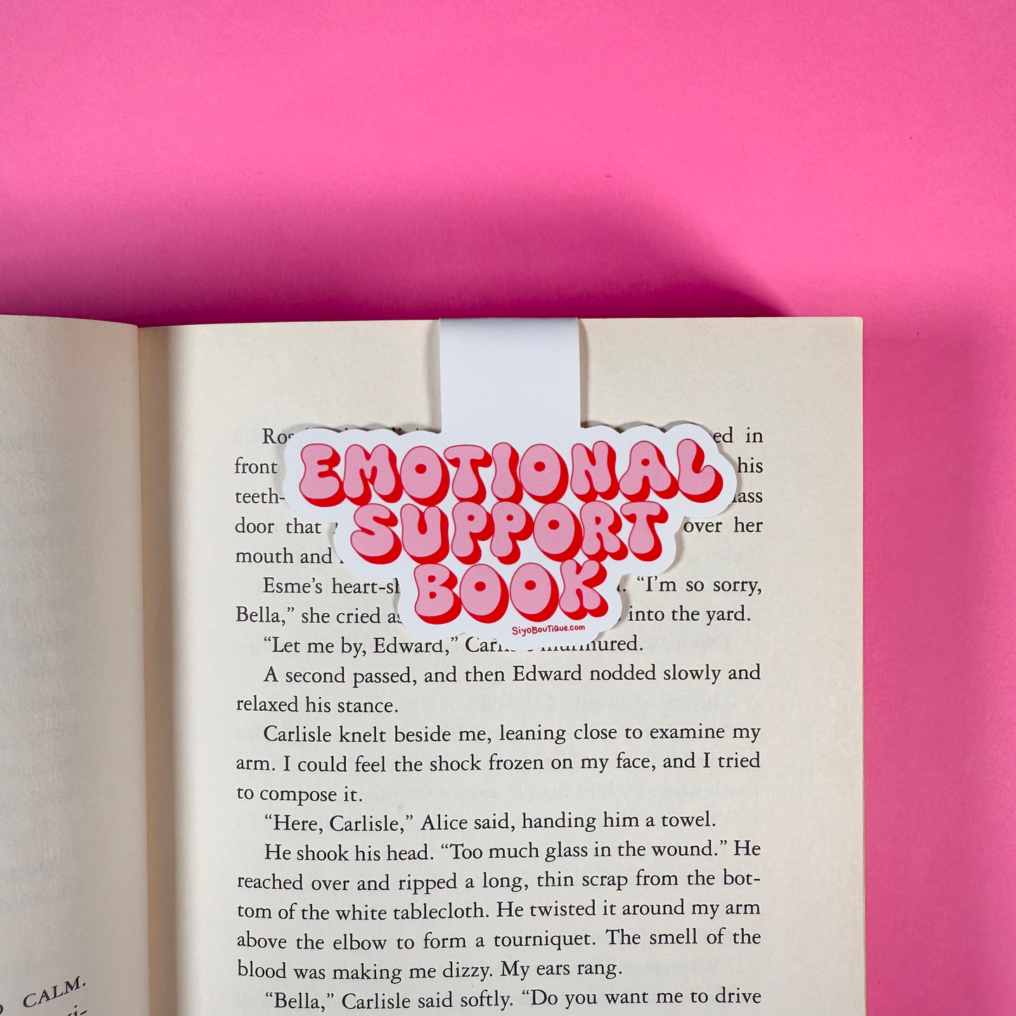 Open book with 'Emotional Support Book' text on a pink background