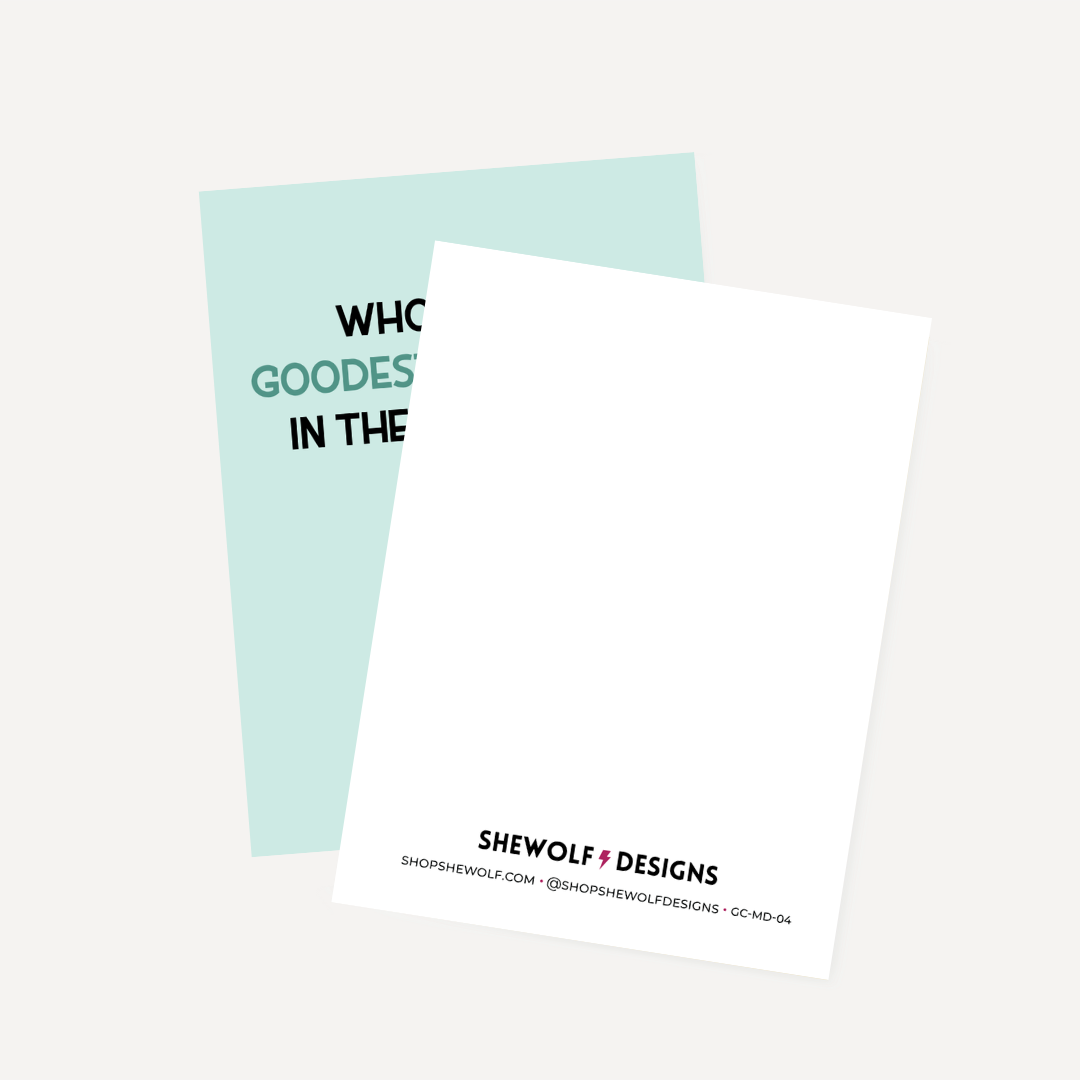 Two greeting cards with text and 'SHEWOLF DESIGNS' branding on a light gray background