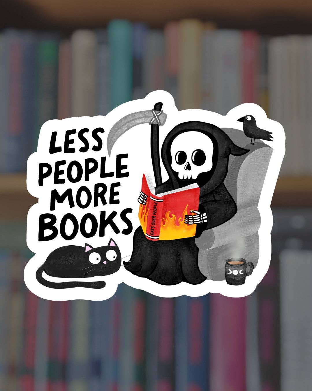 Sticker with a cartoon grim reaper reading a book, surrounded by a cat and a raven, with 'Less People More Books' text, against a blurred bookshelf background.