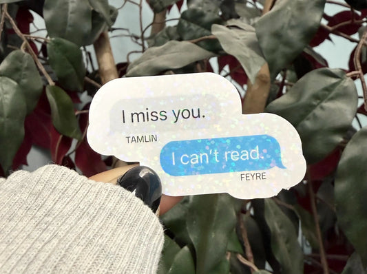 Text bubbles with 'I miss you.' and 'I can't read.' against a leafy background