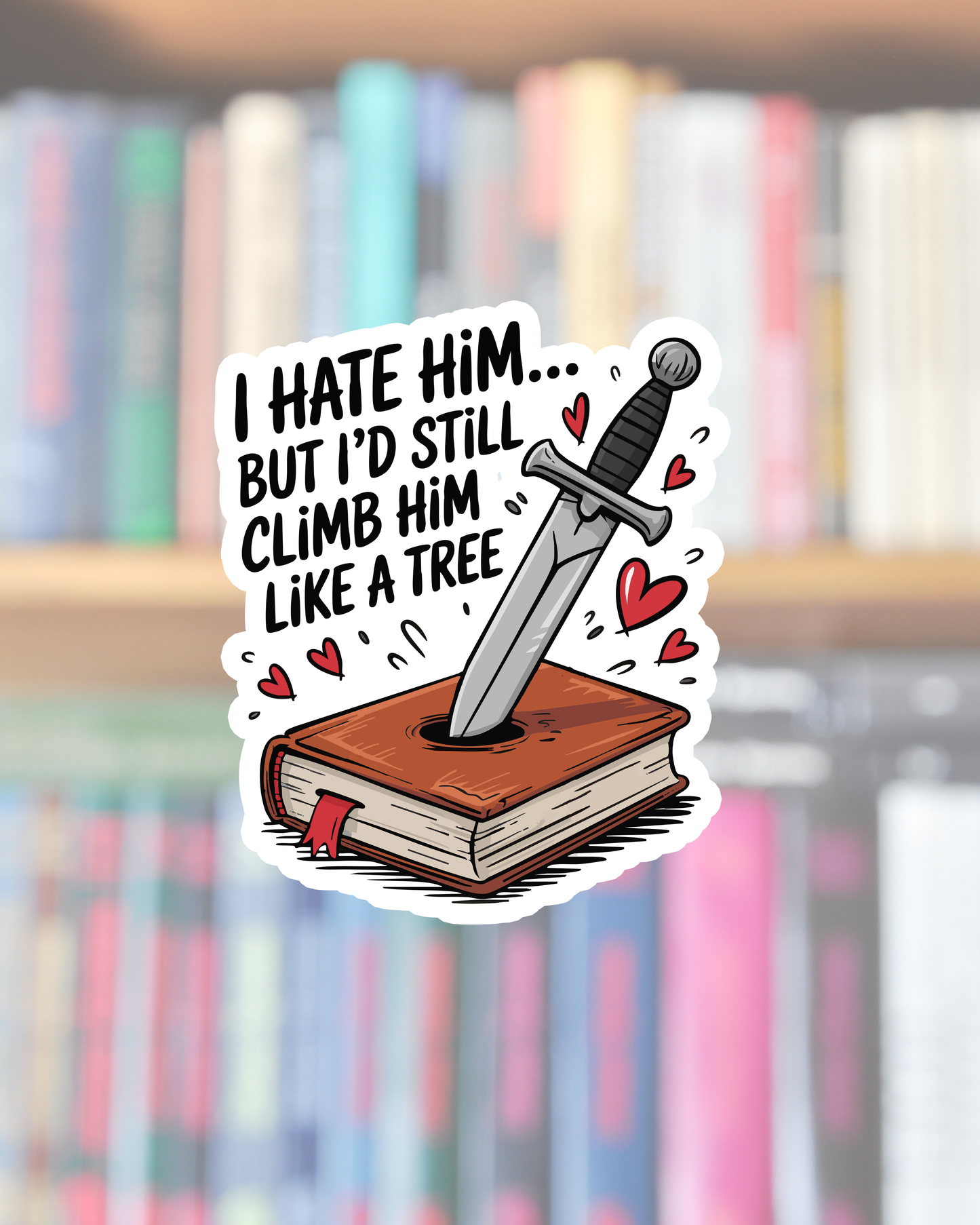 Sticker with a sword on a book and text in front of a blurred bookshelf background