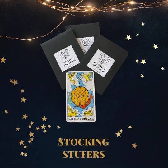 Tarot cards with star decorations on a dark background, labeled 'Stocking Stuffers'.