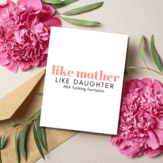 Greeting card with 'like mother like daughter' text surrounded by pink flowers and a brown envelope.