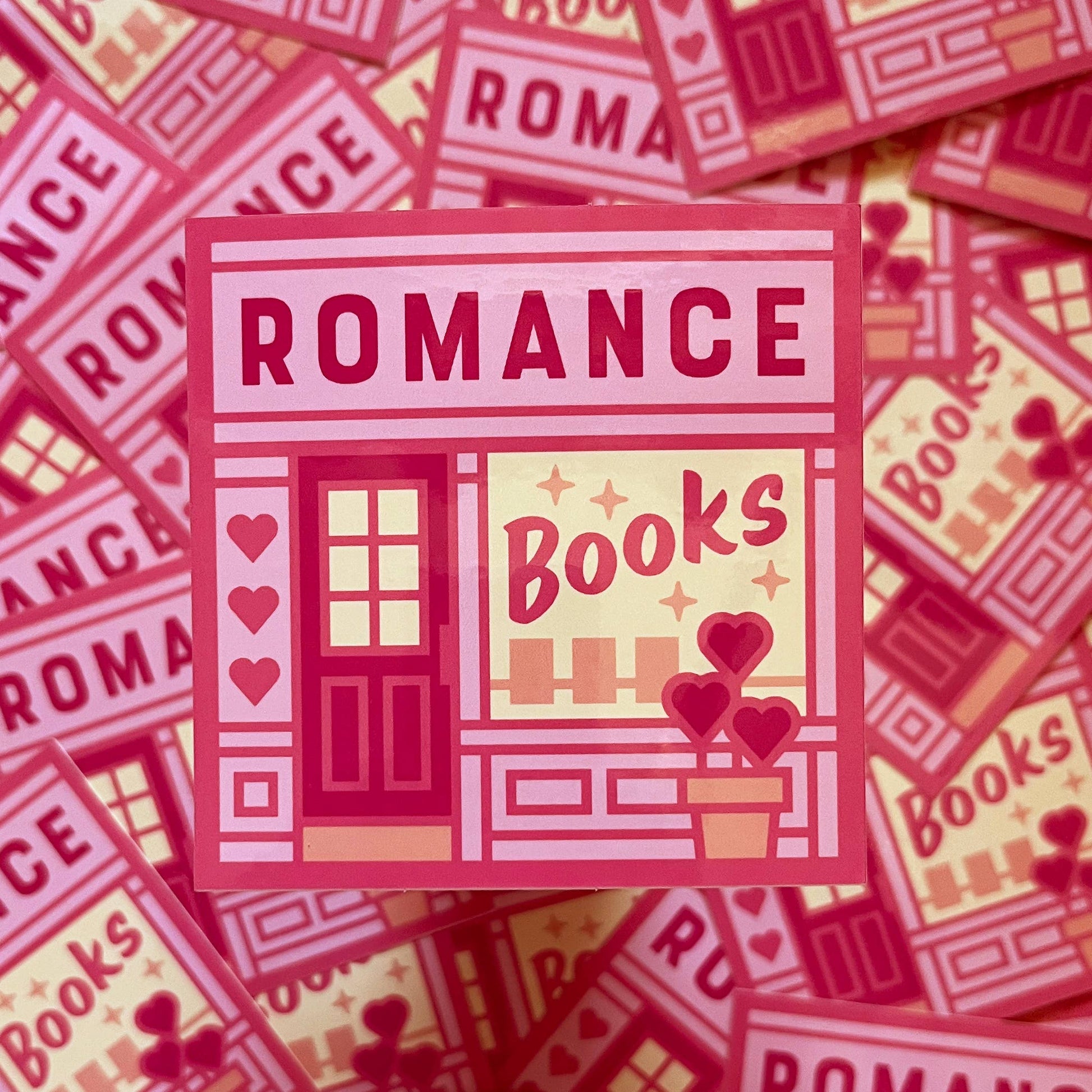 Sticker with 'ROMANCE Books' design on a background of similar stickers.