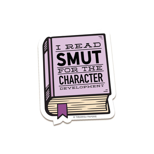 Sticker of a book with text 'I read smut for character development' on a white background