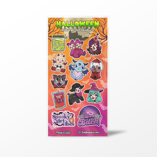 A vertical sticker sheet featuring cute cartoon characters in Halloween-themed outfits, including a witch, vampire, ghost, gumball machine, potion bottle, and spooky animals. The sheet has an orange-to-pink gradient background with 'HALLOWEEN waterproof stickers' at the top and 'Spooky Girls Stickers' and 'The Bitch' branding at the bottom.