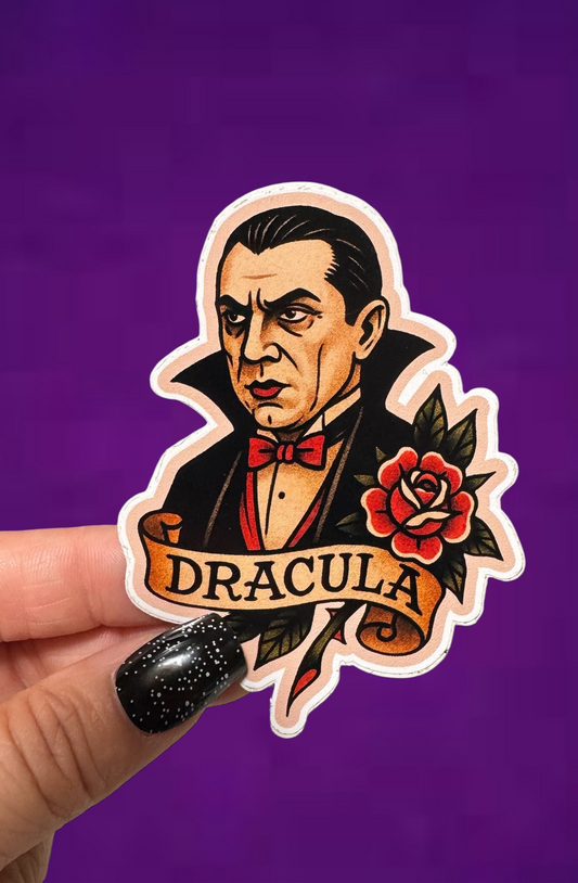 Sticker of a character inspired by Dracula held against a purple background