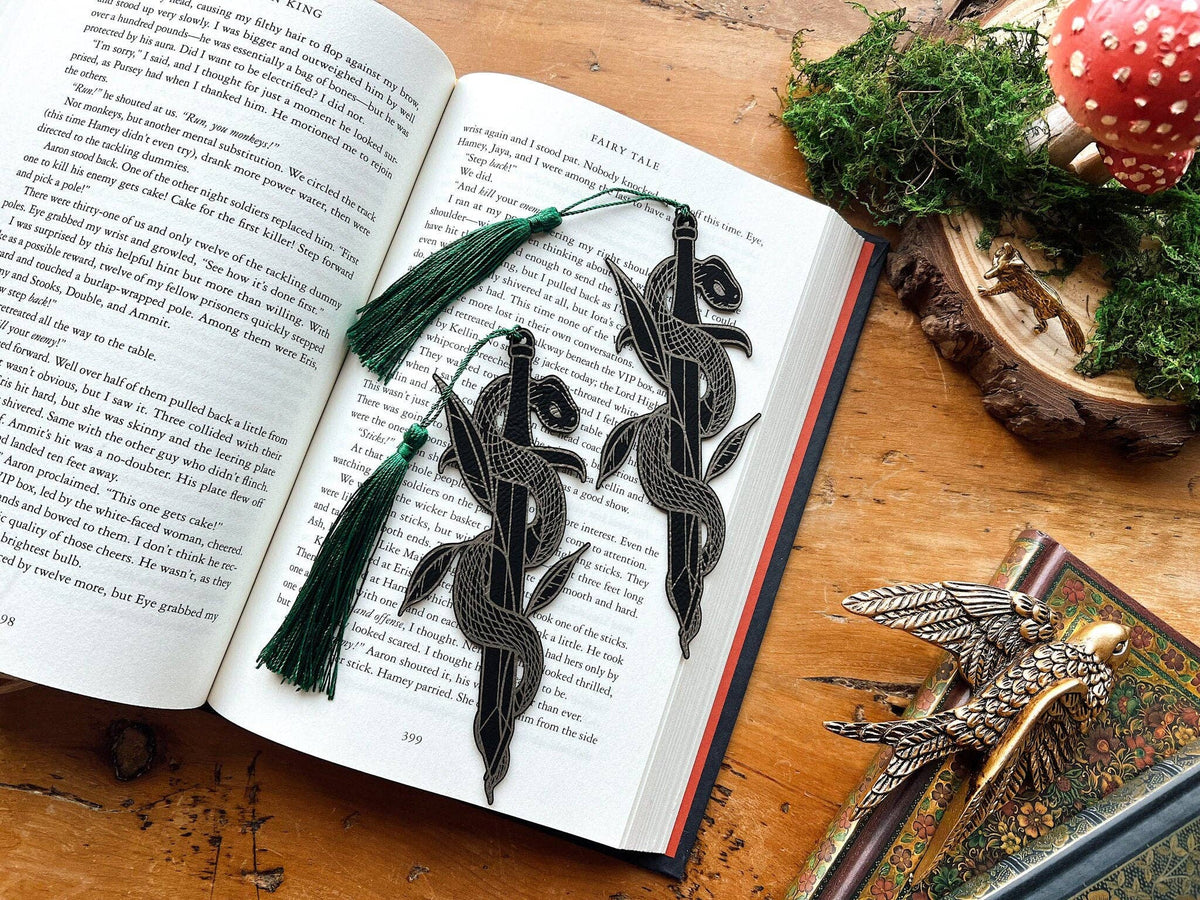 Decorative bookmarks with tassels on an open book