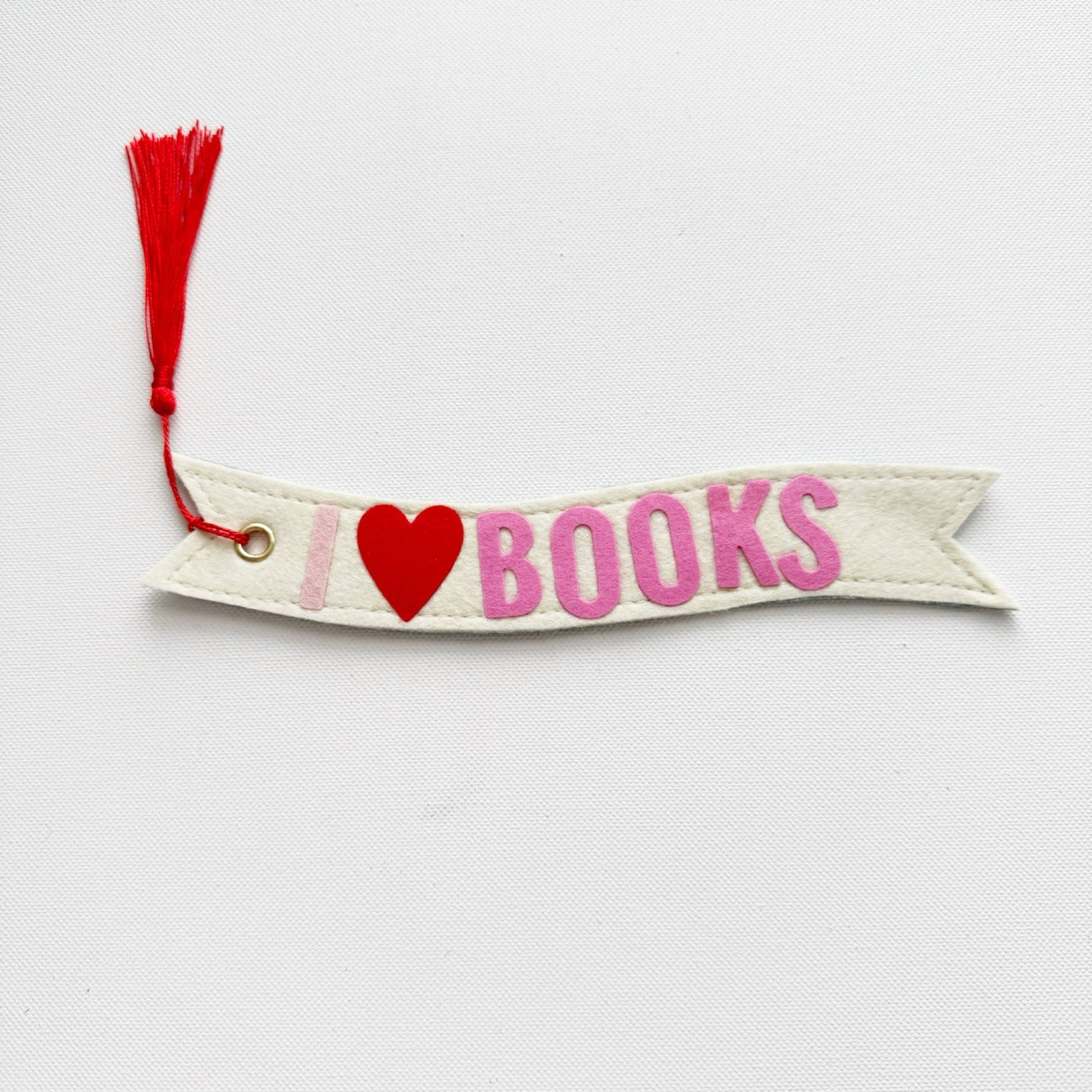 Bookmark with 'I ❤️ BOOKS' text on a white background
