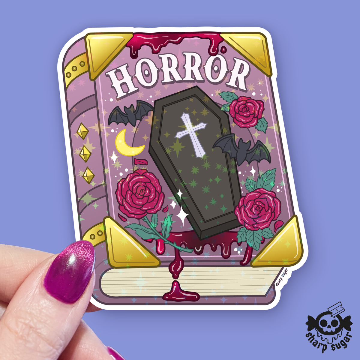 Illustrated card with 'Horror' text, coffin, roses, and bats on a purple background.