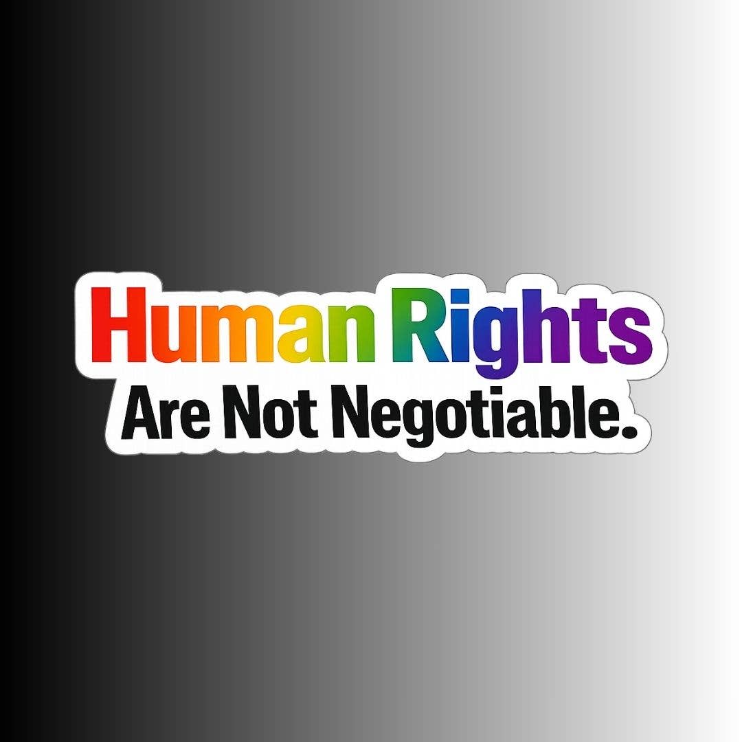 A die-cut vinyl sticker with the text 'Human Rights Are Not Negotiable.' The word 'Human' is colored with a rainbow gradient (red, orange, yellow, green, blue, purple) while 'Rights' and the quote text below are in black.