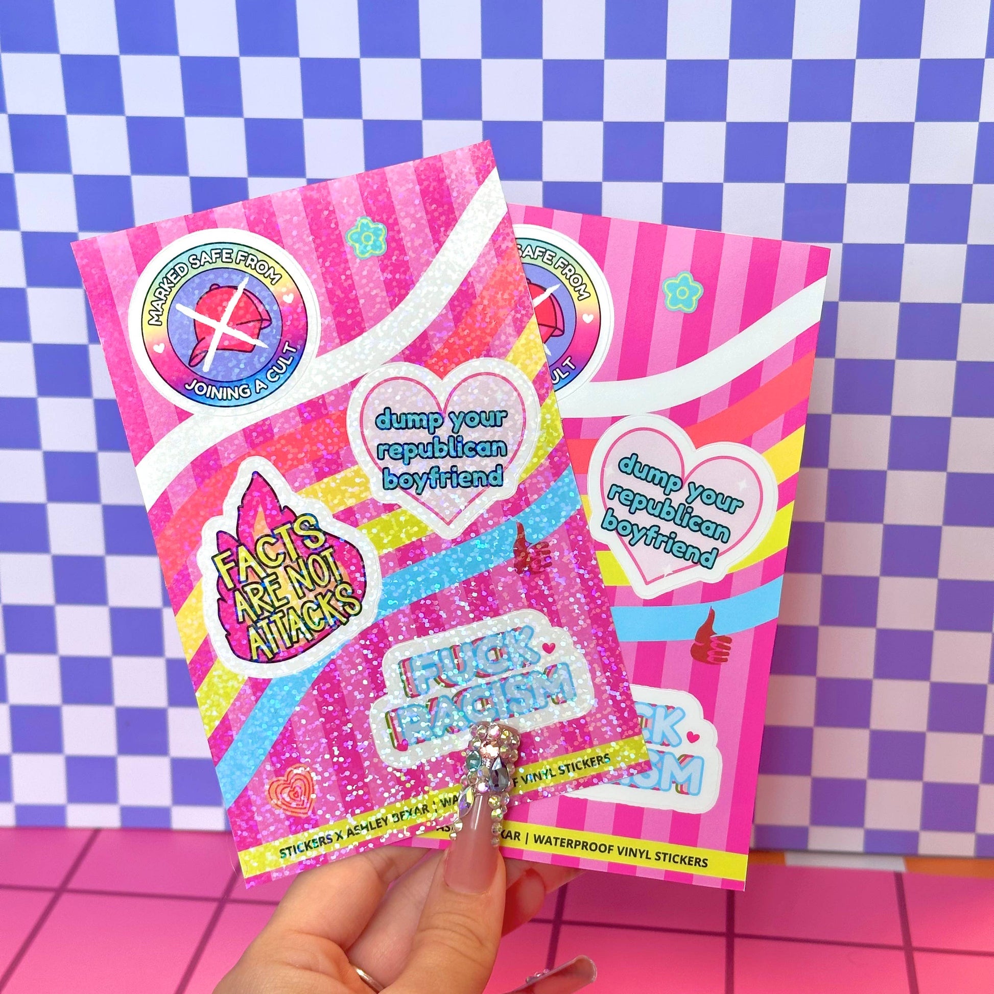 Pink packaging with colorful text and graphics on a checkered background