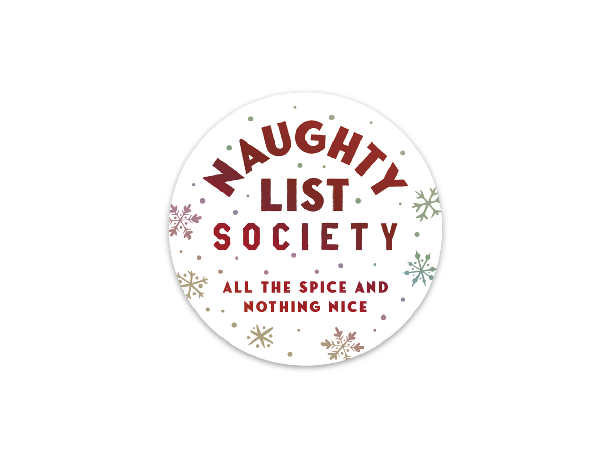 A round white sticker or label with the text 'NAUGHTY LIST SOCIETY' and 'ALL THE SPICE AND NOTHING NICE' in red, decorated with small multicolored snowflakes and dots, shown on a plain white background.