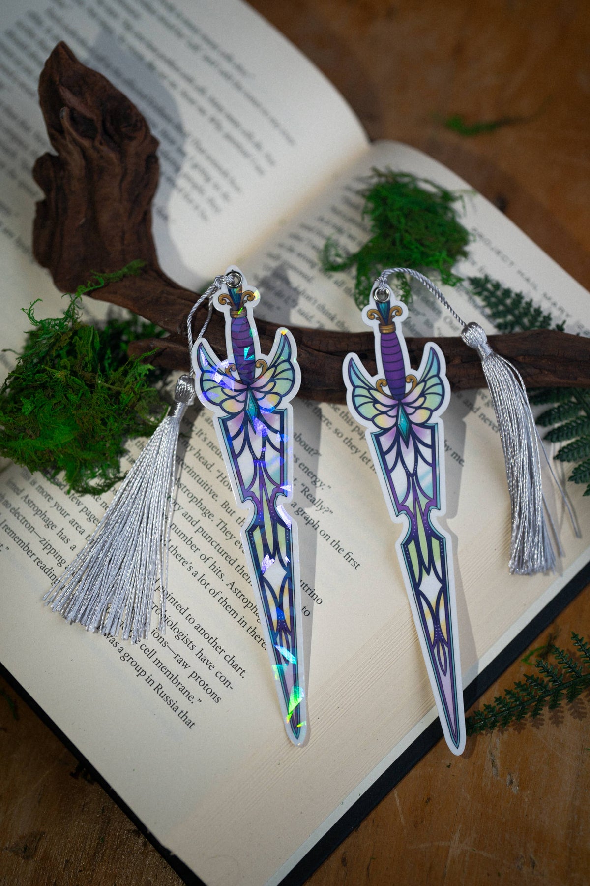 Decorative bookmarks with tassels on an open book