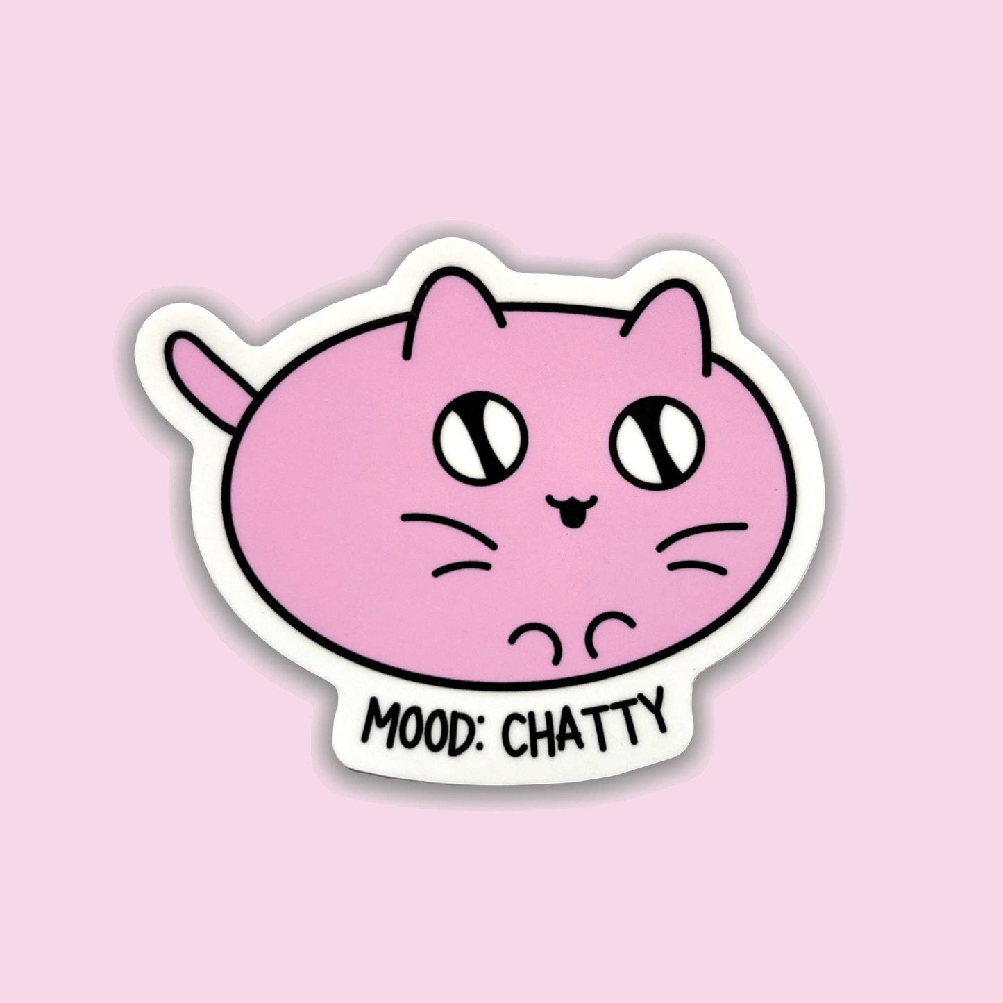A die-cut sticker featuring a pink cartoon cat face with the text 'MOOD: CHATTY' in black, shown on a solid light pink background.