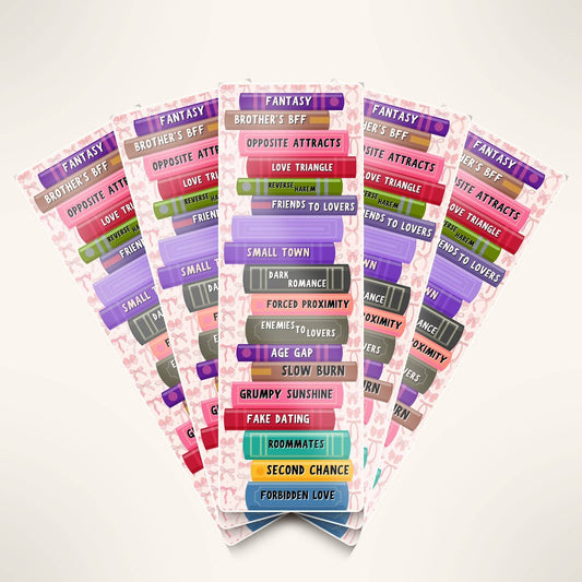 Stack of colorful book genre labels on a white background