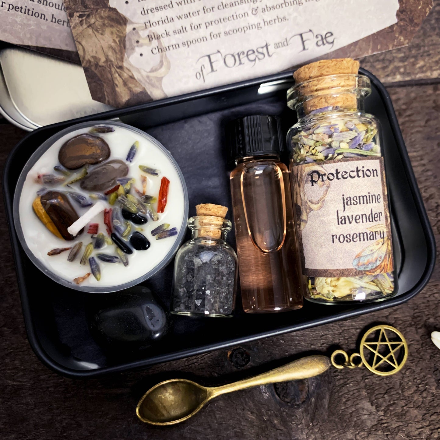 Witchcraft supplies including a candle, bottles labeled 'Protection', and a pentacle on a dark surface.