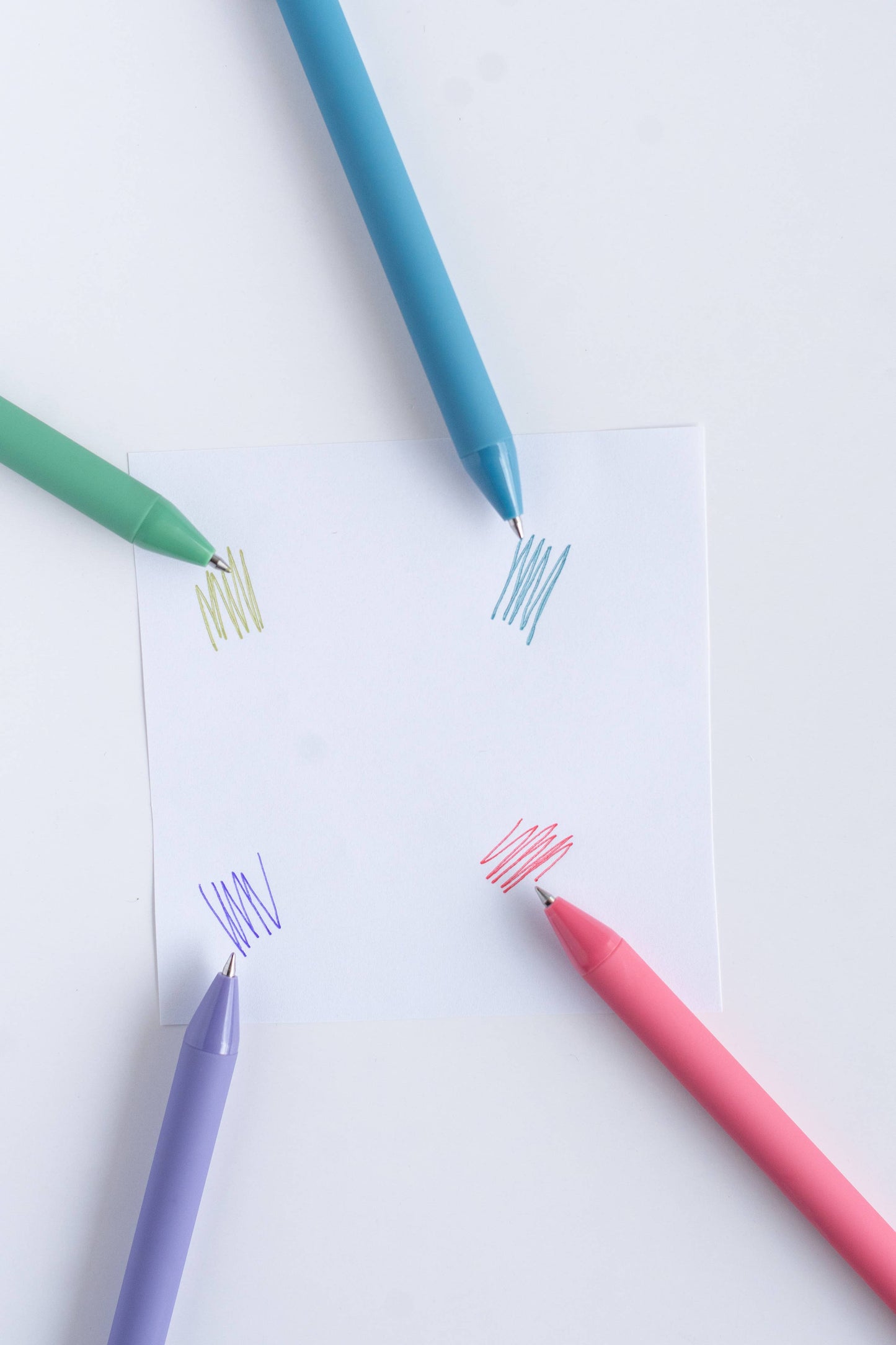 Colorful markers on a white background