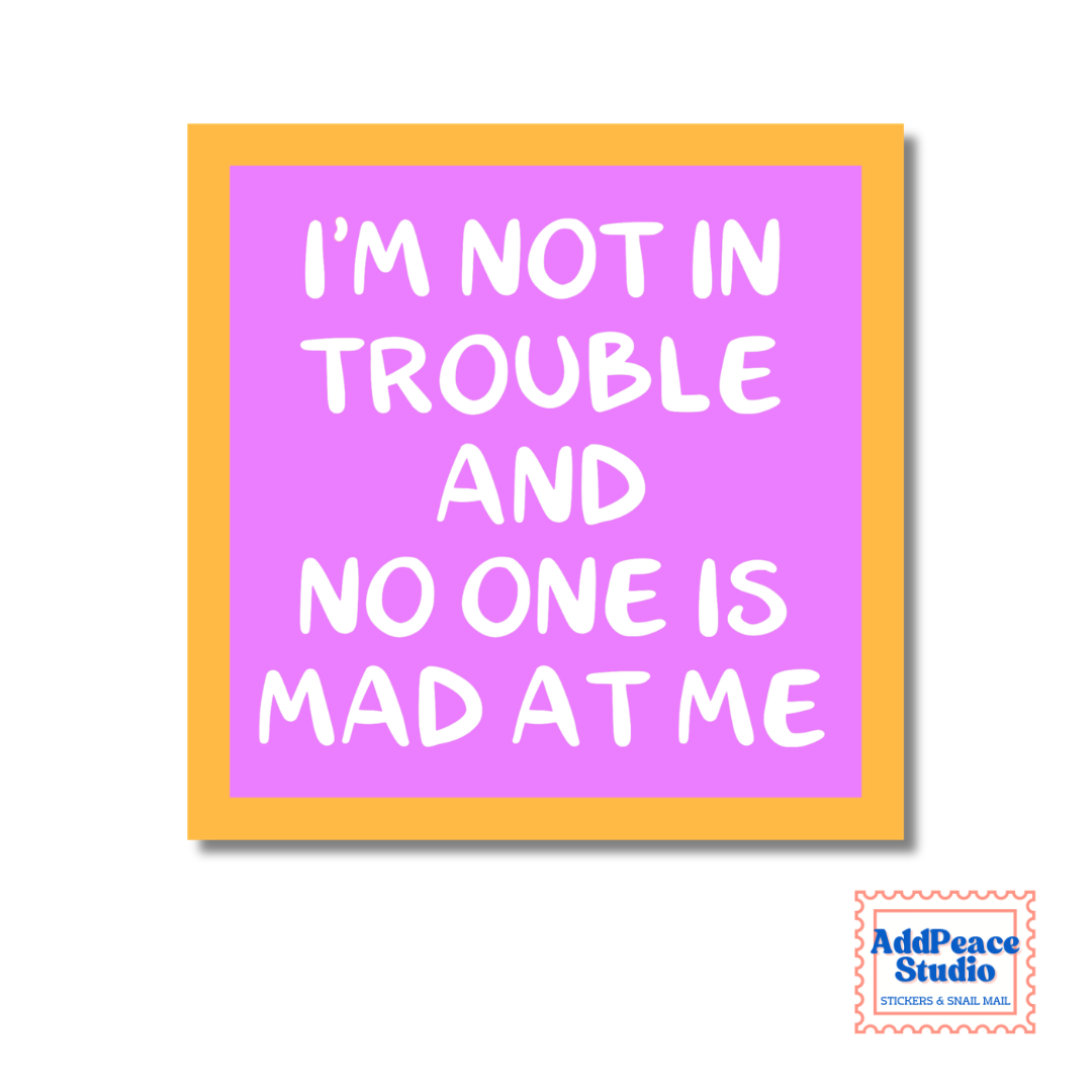 Framed quote 'I'm not in trouble and no one is mad at me' on a purple background with a yellow frame.