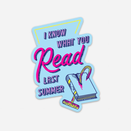 A die-cut sticker with a light blue background and retro-style text reading 'I KNOW WHAT YOU Read LAST SUMMER' in purple and pink lettering, plus an illustration of an open book and a pencil. The sticker is shown on a plain light gray background.