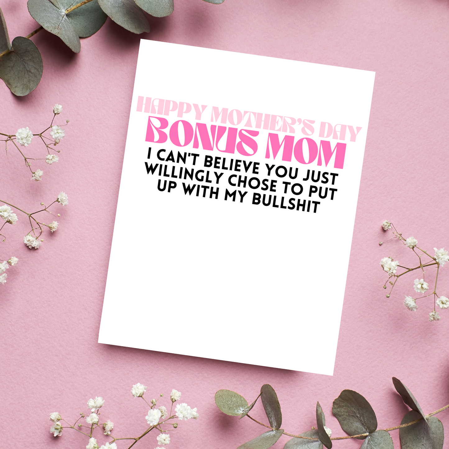 Card with humorous Mother's Day message on a pink background with flowers and leaves.