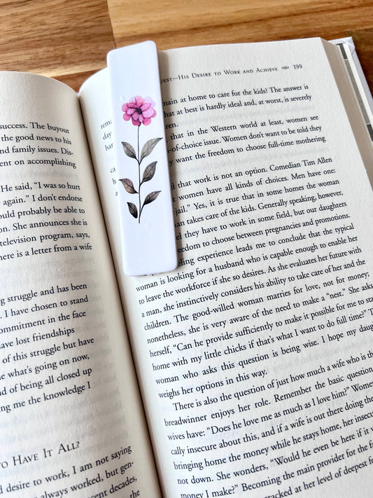 Floral bookmark on an open book