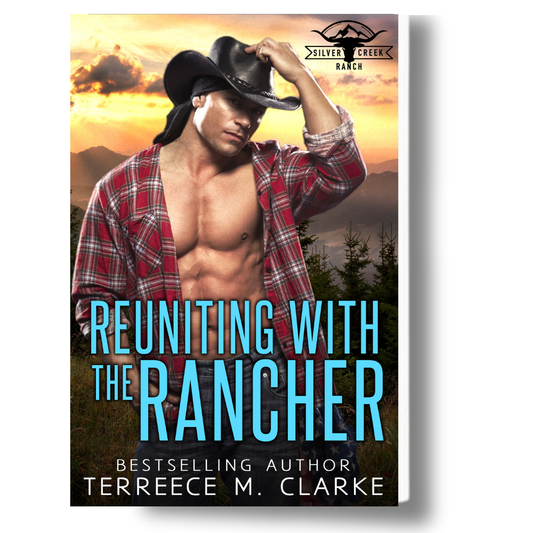 Book cover of 'Reuniting with the Rancher' featuring a shirtless man in a cowboy hat against a sunset landscape.