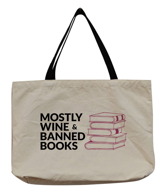 Beige tote bag with black text 'Mostly Wine & Banned Books' and a stack of books graphic on a white background.