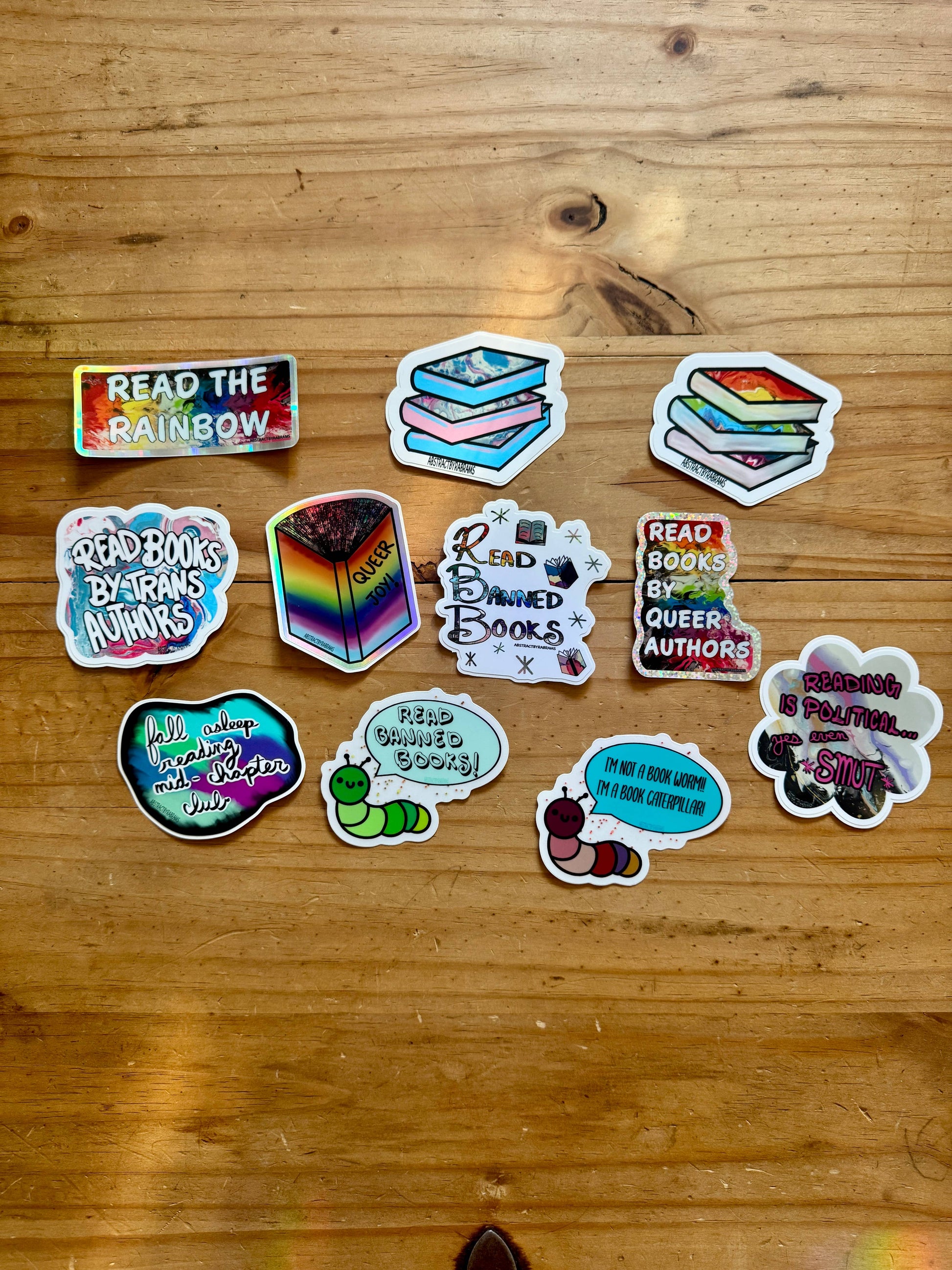 Collection of colorful stickers on a wooden surface