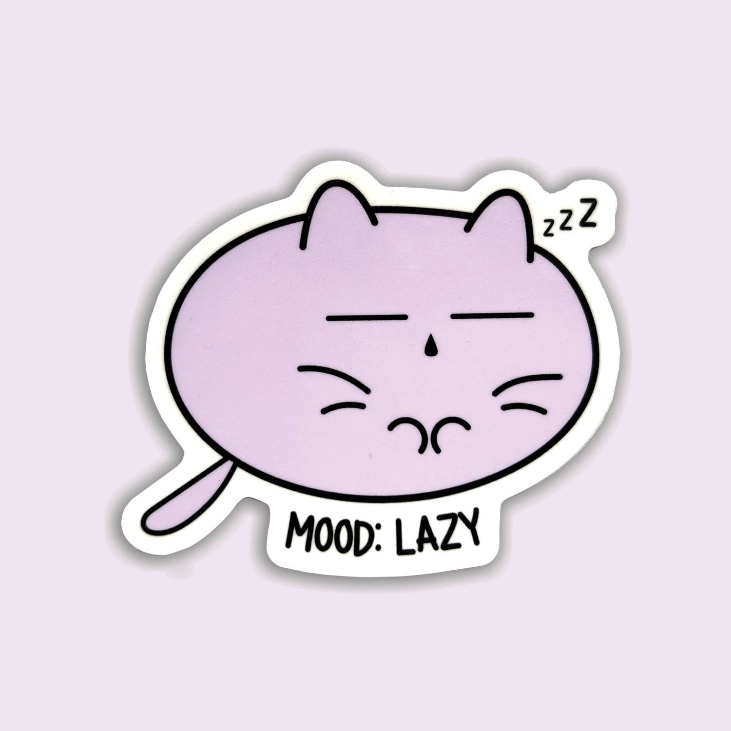 A die-cut sticker featuring a cartoon purple cat sleeping with closed eyes and the text 'MOOD: LAZY' and 'zzz', shown on a pale lavender background.