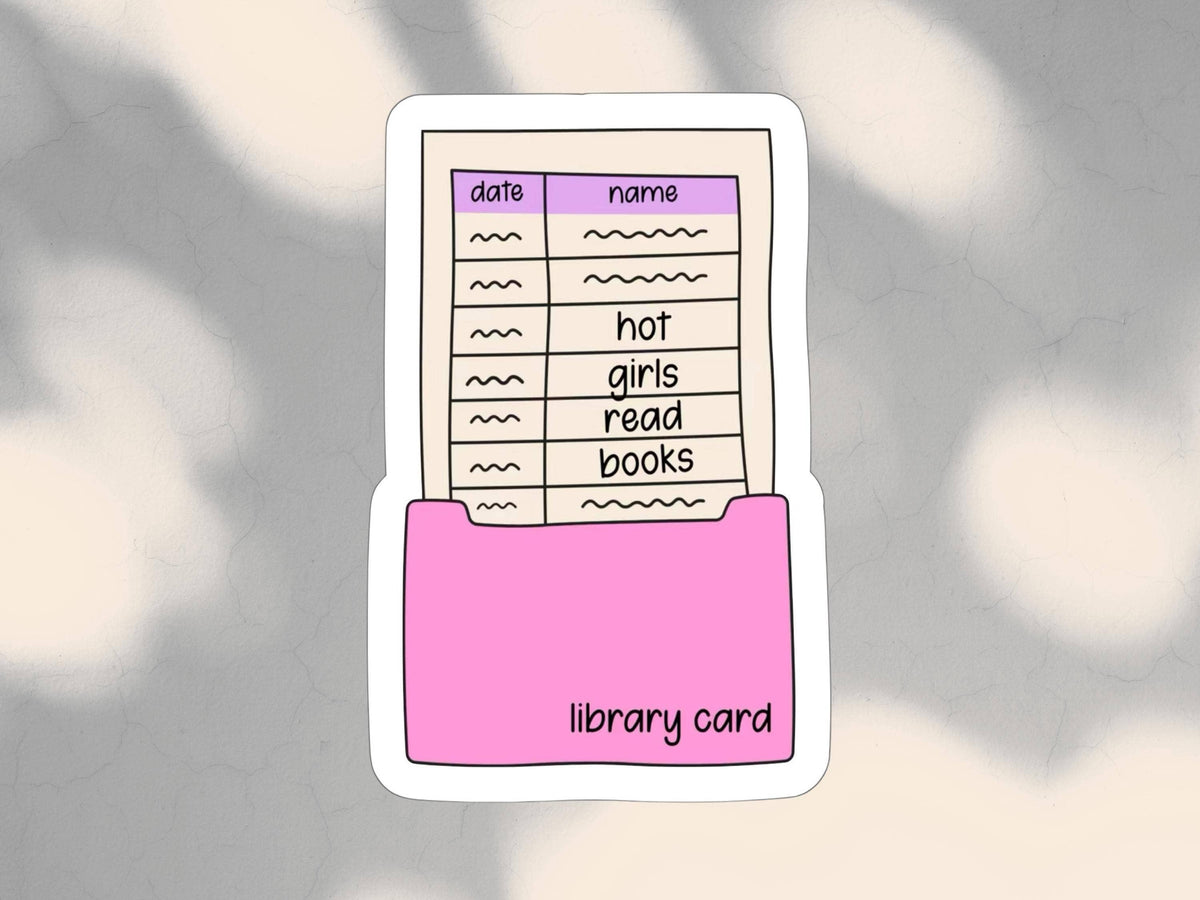 A die-cut sticker featuring a pink folder holding a cream-colored library card with a purple header and handwritten-style entries, shown on a soft gray background with blurred light patches.