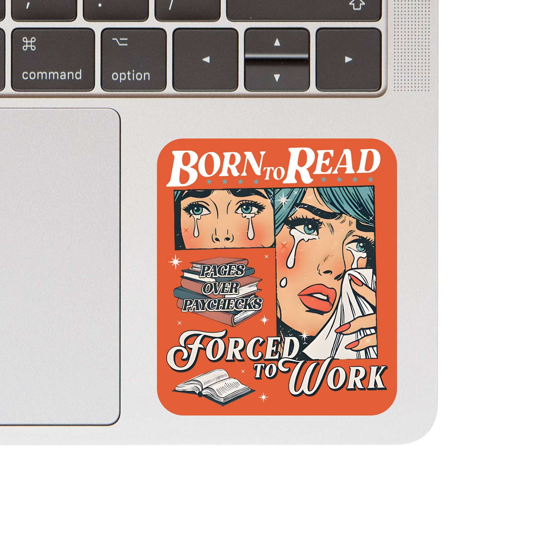 Laptop with a 'Born to Read, Forced to Work' sticker on the palm rest area