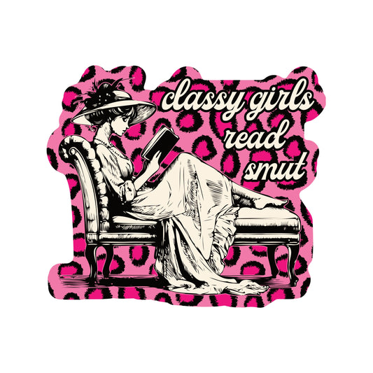Illustration of a woman reading a book with 'classy girls read smut' text on a pink leopard print background.