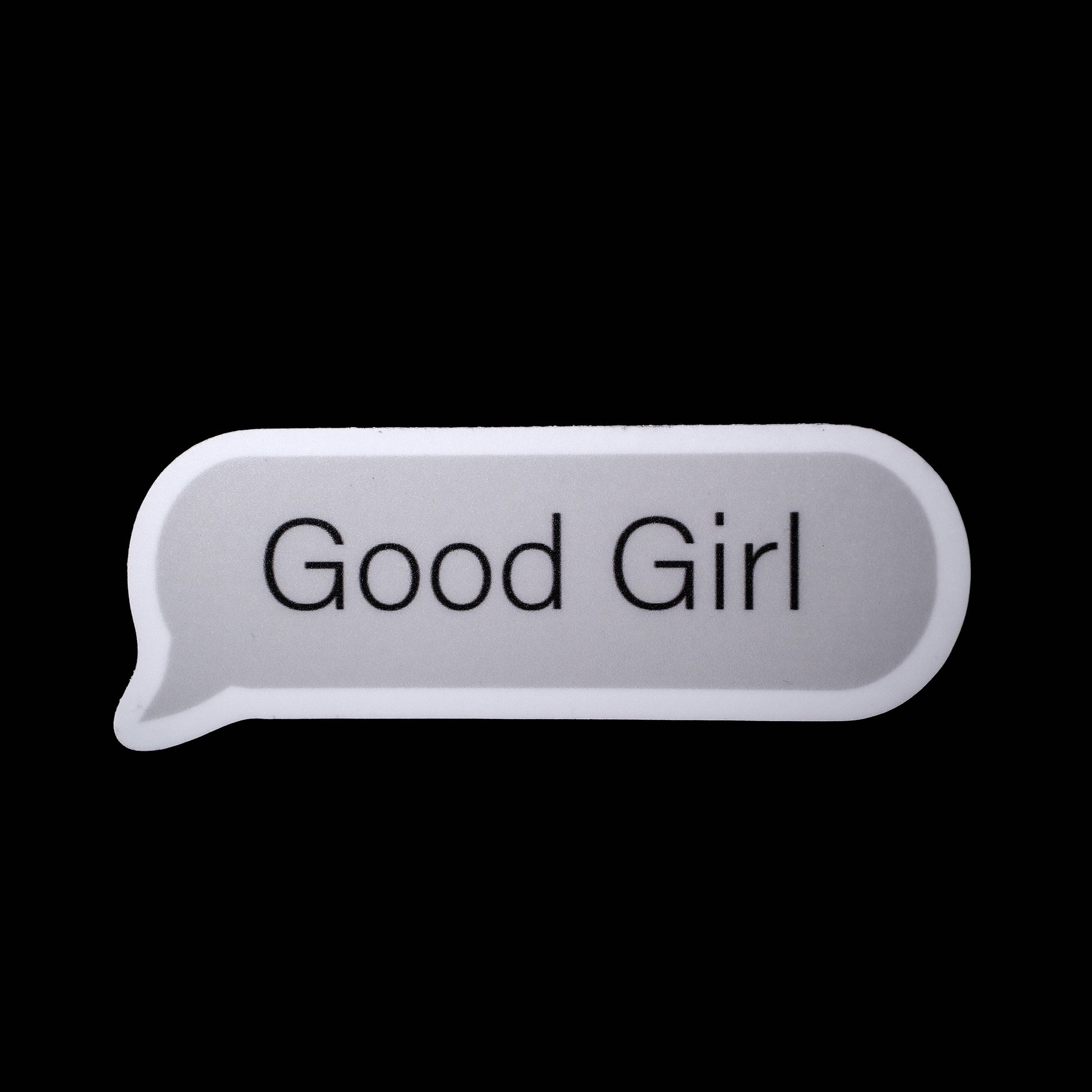 Metallic speech bubble with 'Good Girl' text on a black background