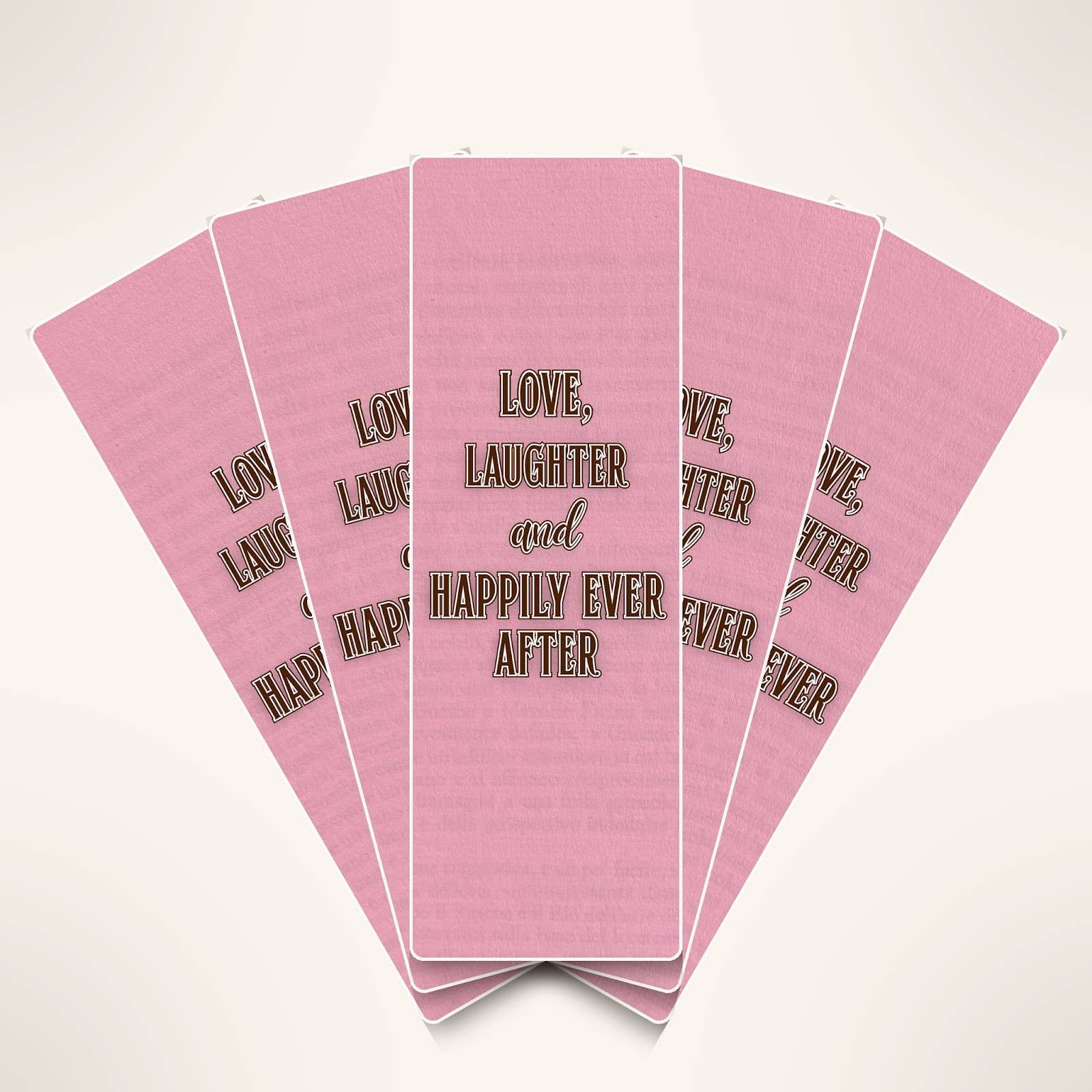 Stack of pink cards with text 'Love, Laughter and Happily Ever After' on a white background