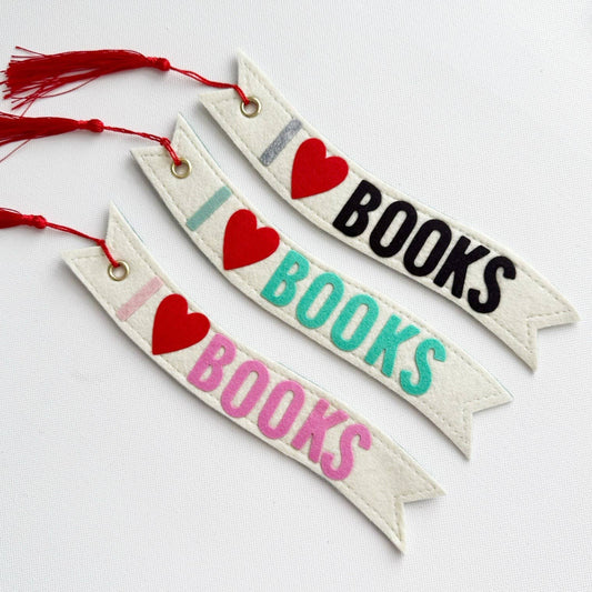 Three fabric bookmarks with 'I ❤️ BOOKS' text on a white background