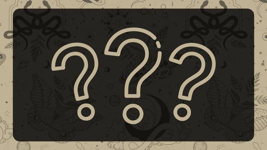 Three question marks on a textured black background with a beige border featuring leaf patterns.