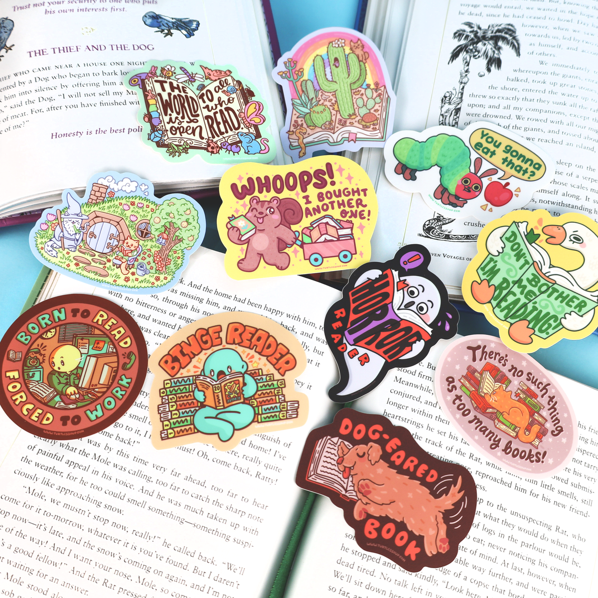 Collection of colorful book-themed stickers on an open book