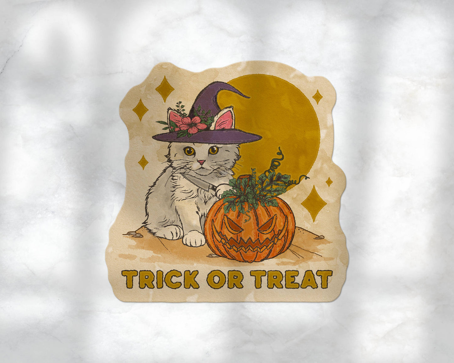 A die-cut sticker featuring a cute white kitten in a witch hat next to a carved orange pumpkin, with the words 'TRICK OR TREAT' below, shown on a textured white background.