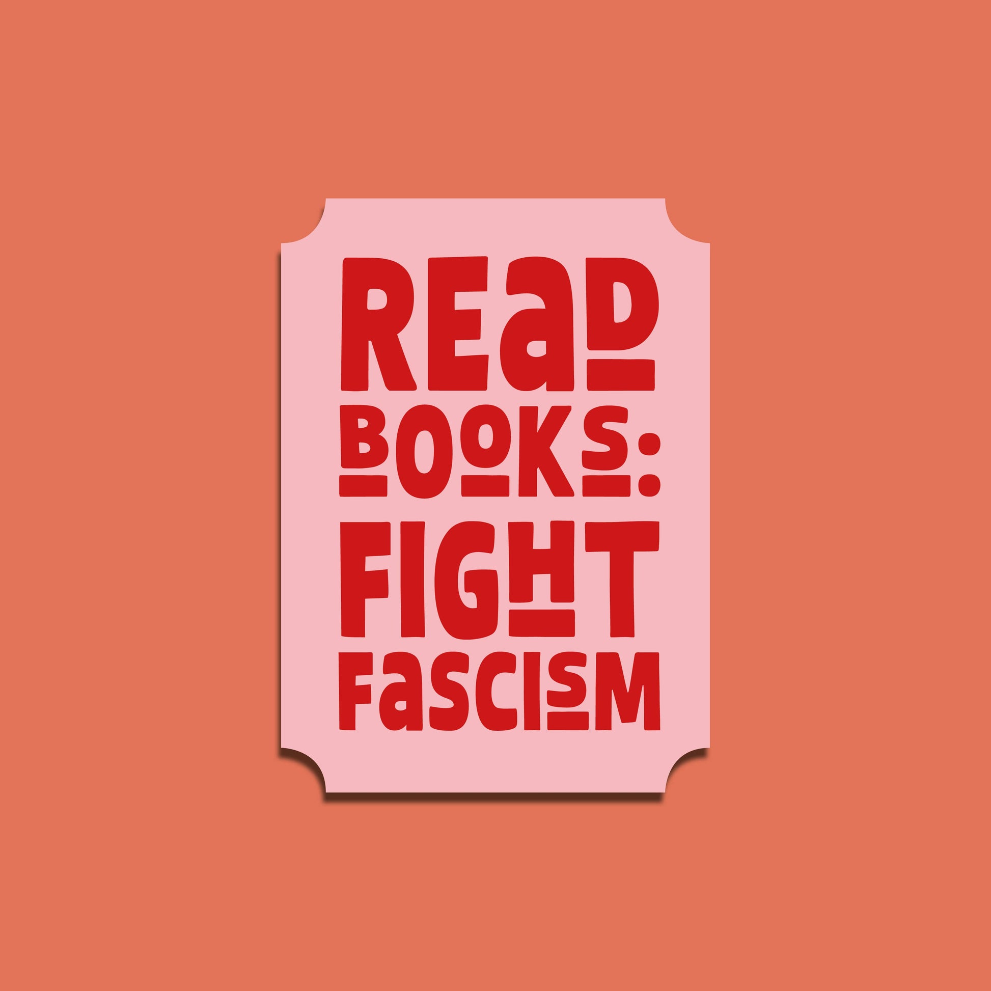 Pink sticker with red text 'Read Books: Fight Fascism' on a peach background
