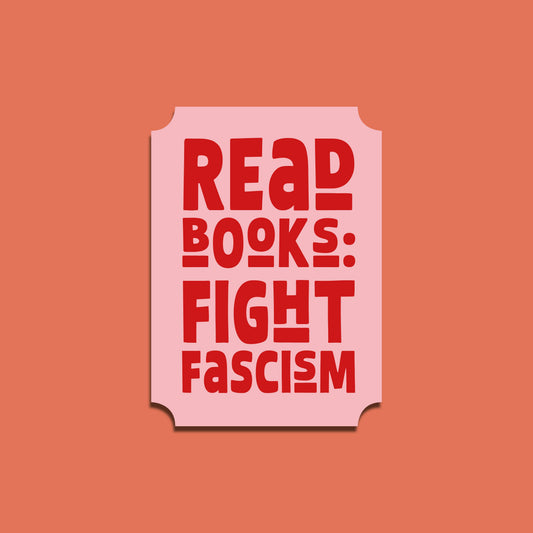 Pink sticker with red text 'Read Books: Fight Fascism' on a peach background