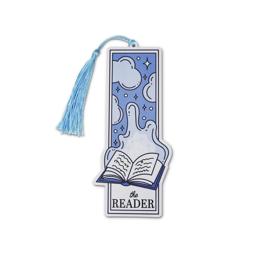 Bookmark with tassel featuring an illustration of a book and clouds, labeled 'the Reader'.