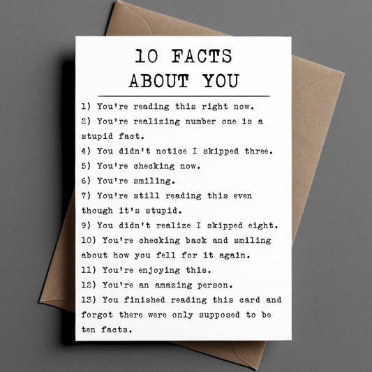 Card with '10 Facts About You' text on a gray background