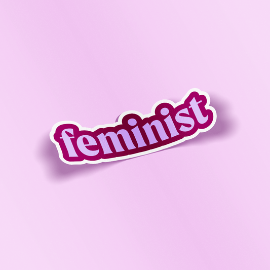 Sticker with 'feminist' text on a pink background