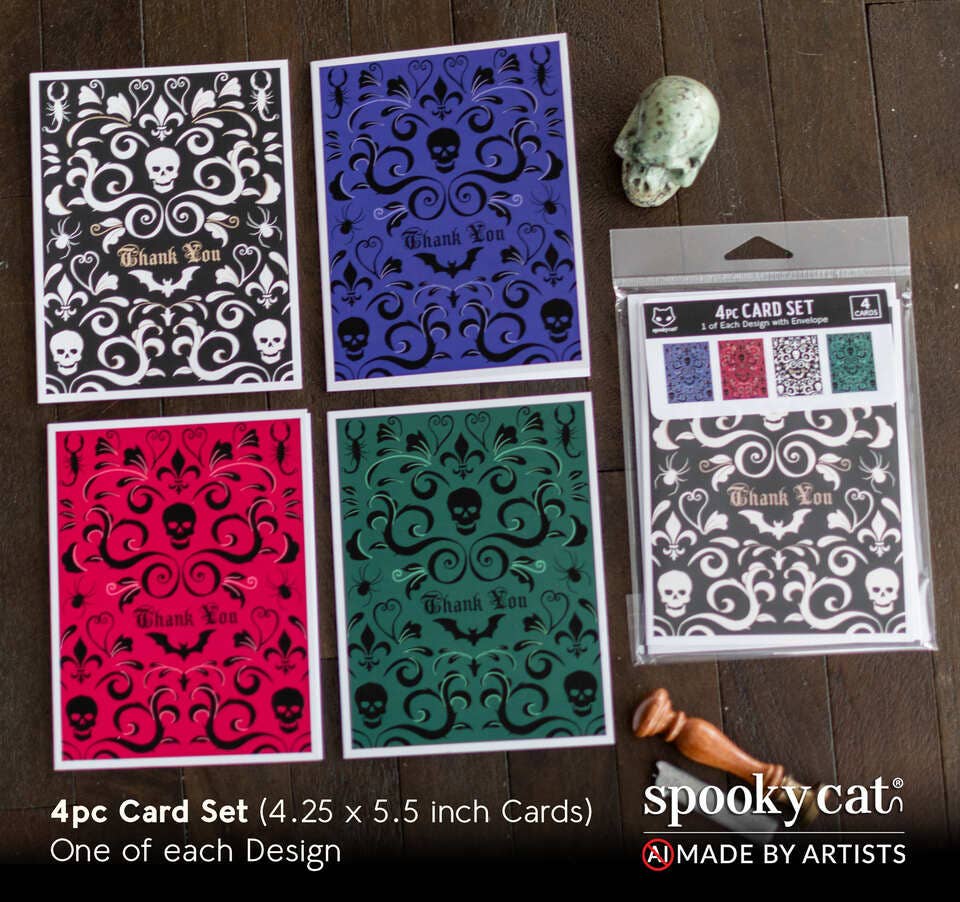Set of four Halloween-themed cards with decorative patterns and 'Thank You' text, displayed on a wooden surface with 'Spooky Cat' packaging.