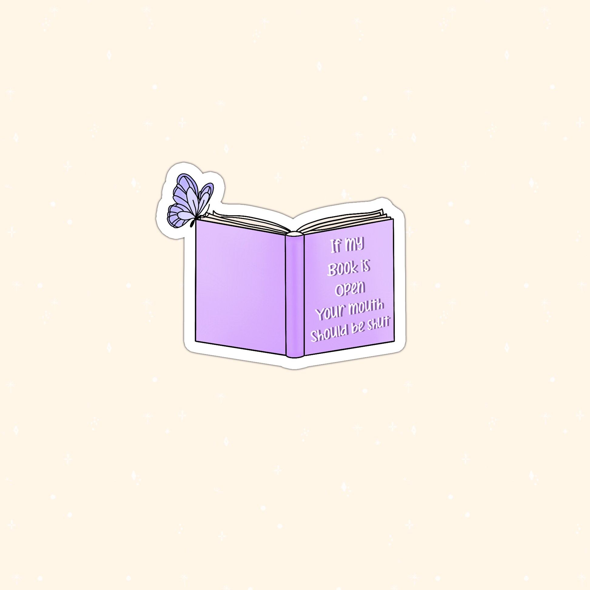 A die-cut sticker featuring a light purple open book with the quote 'if my book is open, your mouth should be open' on the right page, plus a small purple butterfly on the left page, shown on a pale beige background.
