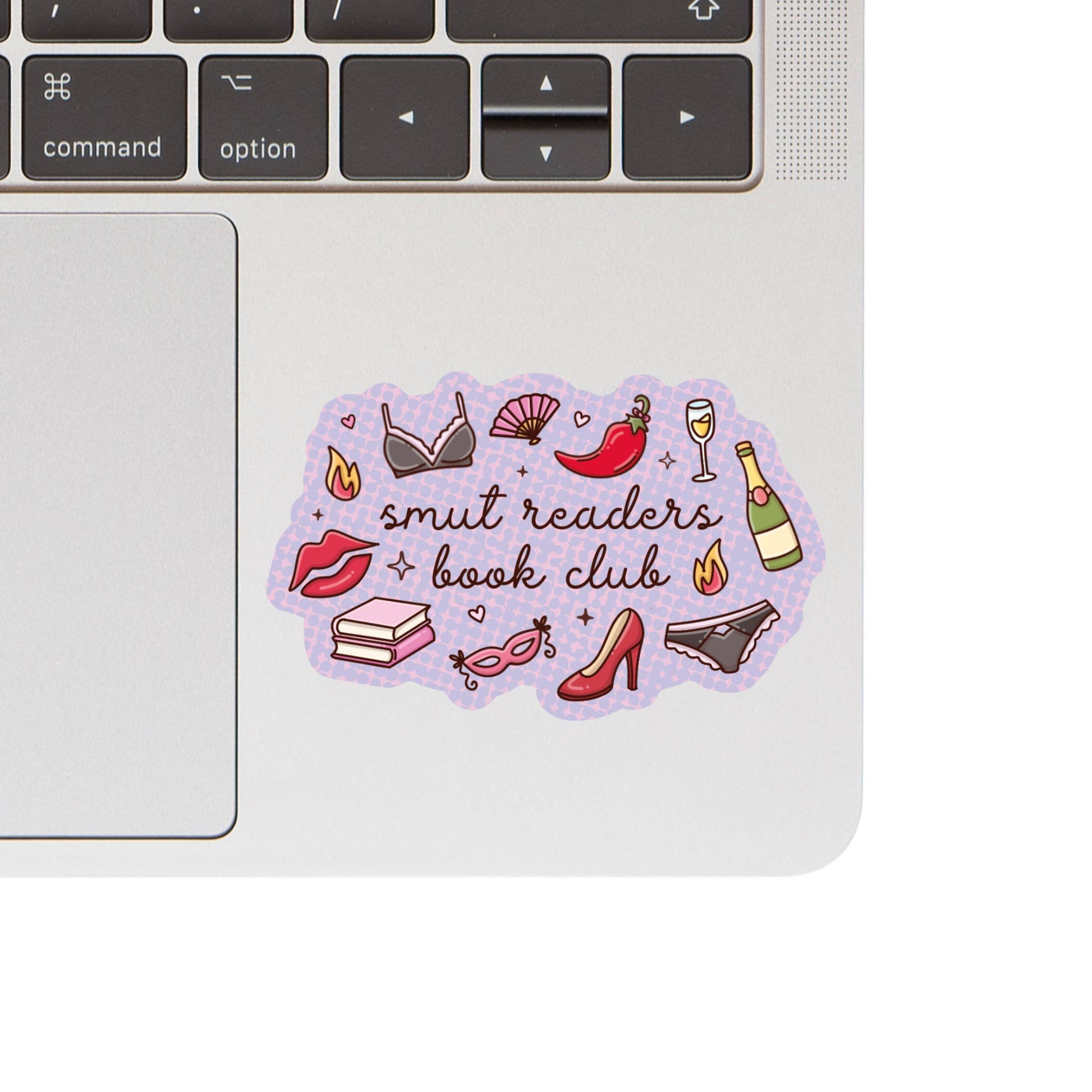 Sticker with 'smut readers book club' text and graphics on a laptop