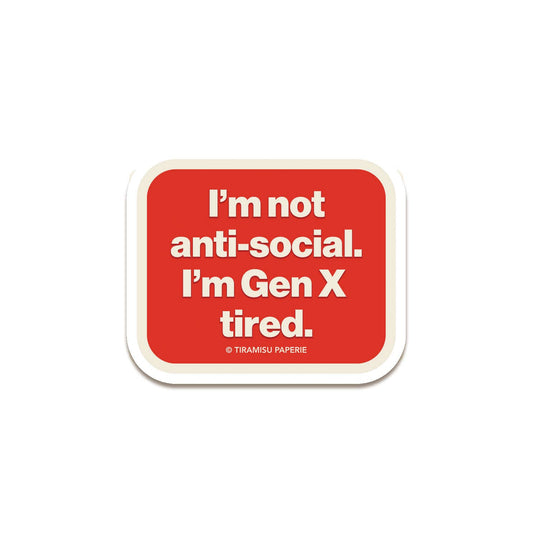 Red square sticker with white text on a white background