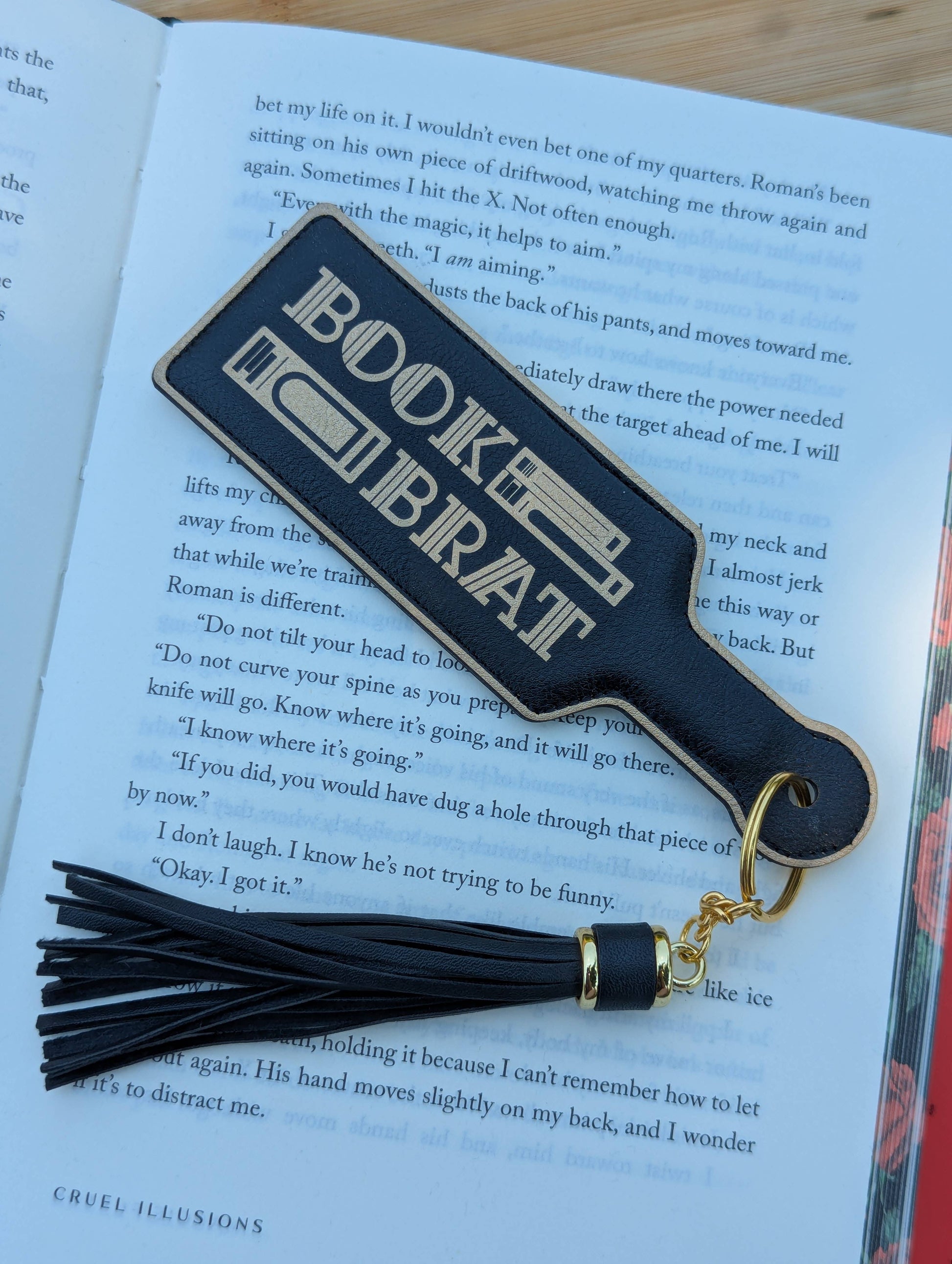 Bookend with tassel labeled 'Bookend' on an open book